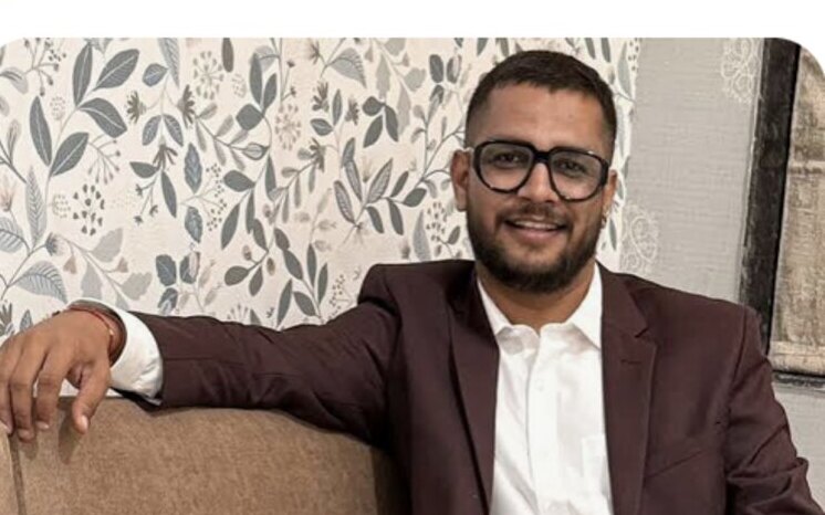 Bhavik Sarkhedi in a brown blazer